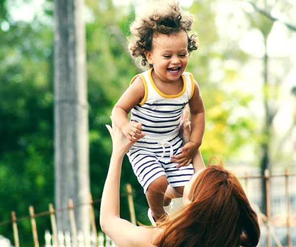 Personal Insurance - Mother and child playing